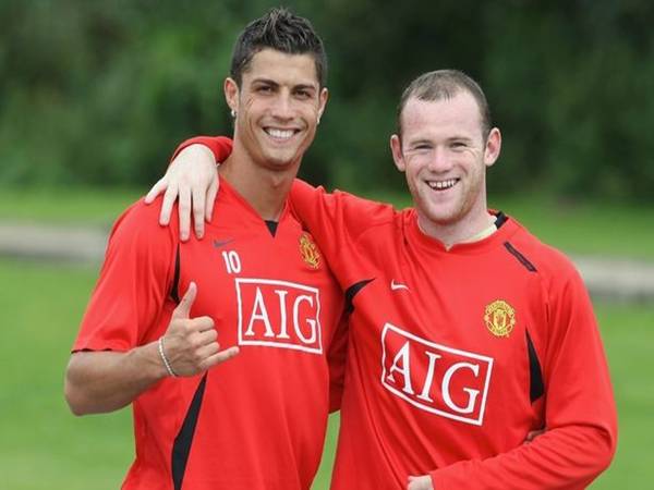 Ronaldo trái / Rooney phải thuộc top những cầu thủ Man Utd giành nhiều danh hiệu nhất